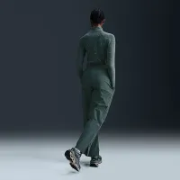 Nike Sportswear Collection жіноча Mid-Rise Repel Asymmetrical-Waist Trousers колір зелений