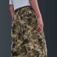 Nike Tech чоловічі Dri-FIT Woven Camo Loose-Fit Pants колір коричневий