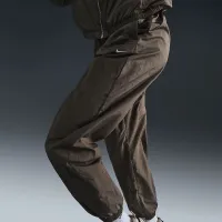 Nike Sportswear Essential жіноча Mid-Rise оверсайз Woven Joggers колір коричневий