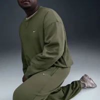 Nike Solo Swoosh чоловічі Cuffed Fleece Pants колір зелений