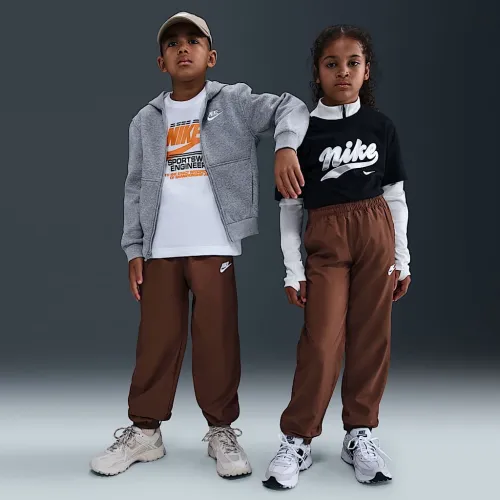 Nike Sportswear Club Big дитячі Woven Joggers колір коричневий