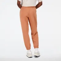 Штани New Balance WP31508SEI - Оранжеві