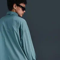 Nike Sportswear Chill Poplin жіноча Loose Long-Sleeve Button-Up Top блакитний