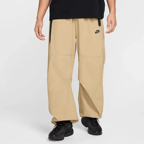 Nike Tech чоловічі Woven оверсайз Pants колір коричневий