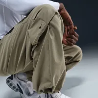 Nike Tech чоловічі Woven оверсайз Pants колір зелений