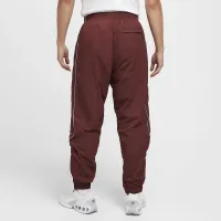Nike Solo Swoosh чоловічі спортивні штани колір коричневий