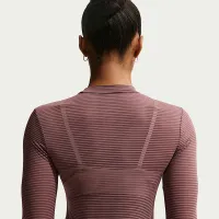 Nike Sportswear женская Tight Long-Sleeve Sheer Top цвет фиолетовый