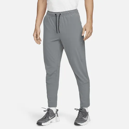 Nike Unlimited чоловічі Dri-FIT Zippeколір червоний Cuff Versatile Pants колір сірий