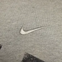 Nike Primary Swoosh чоловічі Dri-FIT Short-Sleeve Versatile Top колір сірий