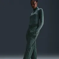 Nike Sportswear Collection жіноча Mid-Rise Repel Asymmetrical-Waist Trousers колір зелений