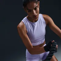 Nike Pro жіноча Dri-FIT Cropped Tank Top колір фіолетовий
