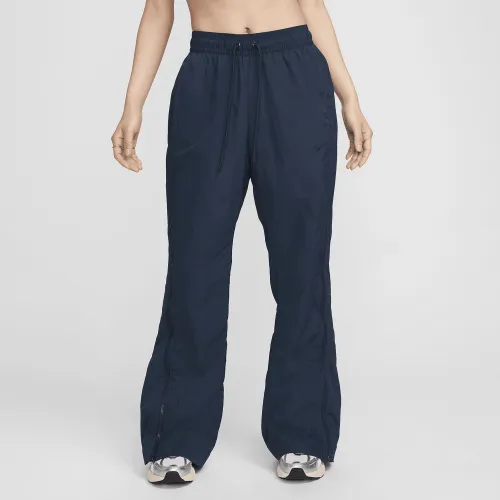 Nike Sportswear Collection женская Mid-Rise Repel Zip Pants синий