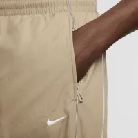 Nike Solo Swoosh чоловічі спортивні штани колір коричневий