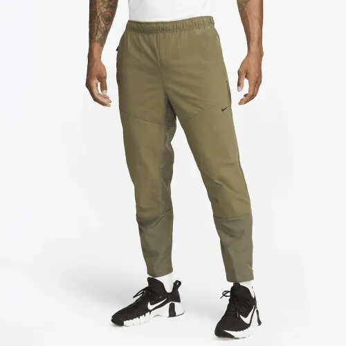 Nike A.P.S. мужские Dri-FIT ADV Woven Versatile Pants цвет зеленый