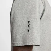 Nike NOCTA футболка колір сірий