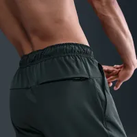Nike Unlimited мужские Dri-FIT Tapeцвет красный Leg Versatile Pants цвет зеленый