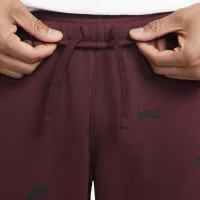 Nike Club Fleece чоловічі Brushed-Back Allover Print Joggers колір червоний