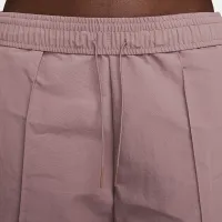 Nike Sportswear Everything Wovens жіноча Mid-Rise Open-Hem Pants колір фіолетовий