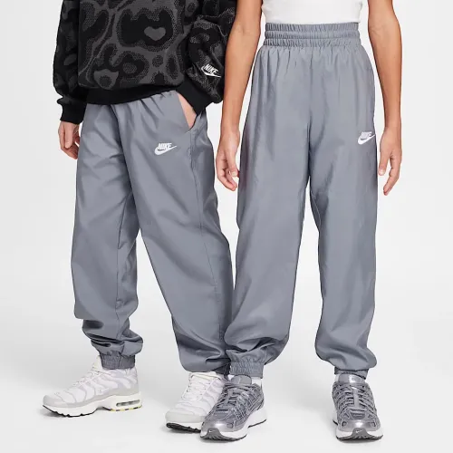 Nike Sportswear Club Big дитячі Woven Joggers колір сірий