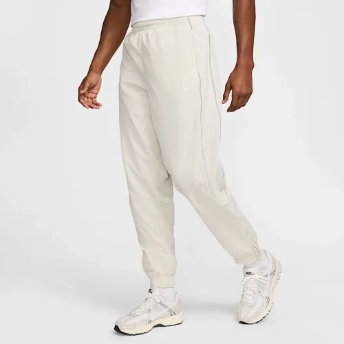 Nike Solo Swoosh чоловічі спортивні штани колір сірий