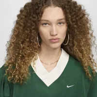 Nike Sportswear Essential женская Loose UV Woven Long-Sleeve V-Neck Top цвет зеленый