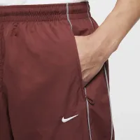Nike Solo Swoosh чоловічі спортивні штани колір коричневий