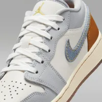 Nike Air Jordan 1 Low SE Big Kids' взуття Grey