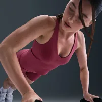 Nike Universa женская Medium-Support Padded Sports Bra Tank цвет фиолетовый