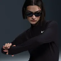 Nike Tour жіноча Dri-FIT ADV 1/2-Zip для гольфу Top колір чорний