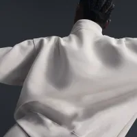 Nike Sportswear Phoenix Fleece женская оверсайз 1/4-Zip Logo Top цвет коричневый