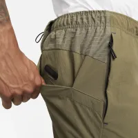 Nike A.P.S. мужские Dri-FIT ADV Woven Versatile Pants цвет зеленый