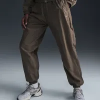 Nike Sportswear Essential жіноча Mid-Rise оверсайз Woven Joggers колір коричневий