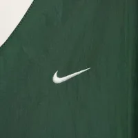Nike Sportswear Essential женская Loose UV Woven Long-Sleeve V-Neck Top цвет зеленый