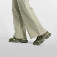 Штани New Balance WP51538OVN - Зелені