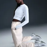 Nike Sportswear Essential жіноча Mid-Rise оверсайз Woven Joggers колір білий