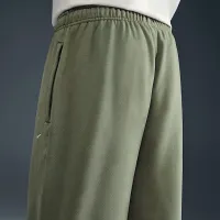 Nike Solo Swoosh чоловічі Cuffed Fleece Pants колір зелений