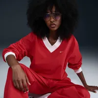 Nike Sportswear Essential женская Loose UV Woven Long-Sleeve V-Neck Top цвет красный