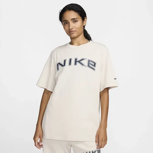 Nike Sportswear жіноча Loose Short-Sleeve Graphic футболка колір коричневий