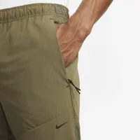 Nike A.P.S. мужские Dri-FIT ADV Woven Versatile Pants цвет зеленый