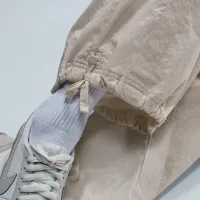 Nike Sportswear женская Mid-Rise Loose Woven Open-Hem Pants цвет белый