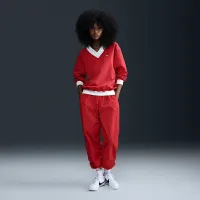 Nike Sportswear Essential женская Loose UV Woven Long-Sleeve V-Neck Top цвет красный