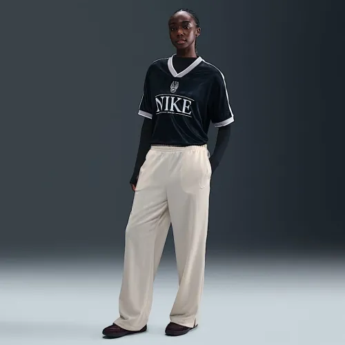 Nike Sportswear женская Mid-Rise Loose Jacquard Striped спортивные штаны цвет коричневый