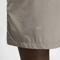 Nike NOCTA Cardinal Nylon шорти колір сірий