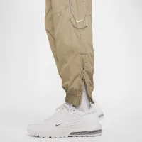 Nike Solo Swoosh чоловічі спортивні штани колір коричневий