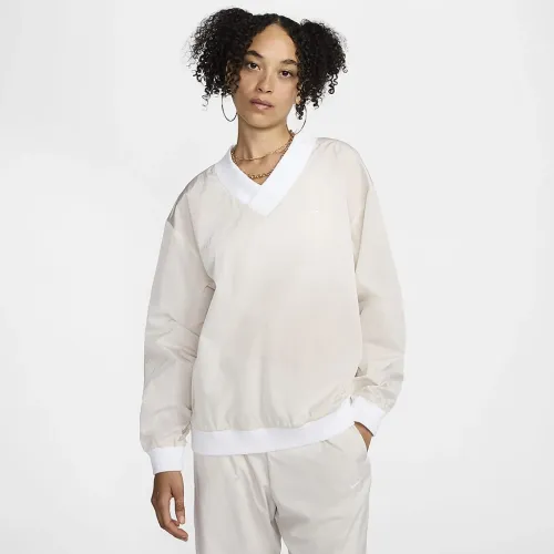 Nike Sportswear Essential женская Loose UV Woven Long-Sleeve V-Neck Top цвет коричневый
