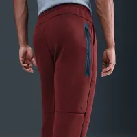 Nike Tech чоловічі Open-Hem Fleece Pants колір червоний