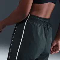 Nike Sportswear Windrunner жіноча Woven Pants колір зелений