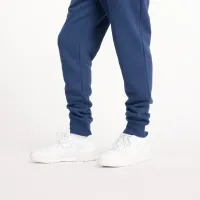 Штани New Balance MP43904NNY - Блакитні