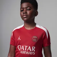 Nike Paris Saint-Germain Strike Fourth Big дитячі Jordan Dri-FIT Soccer Knit Short-Sleeve Top колір червоний