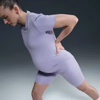 Nike (M) One жіноча Dri-FIT Slim-Fit Short-Sleeve Top (Maternity) колір фіолетовий